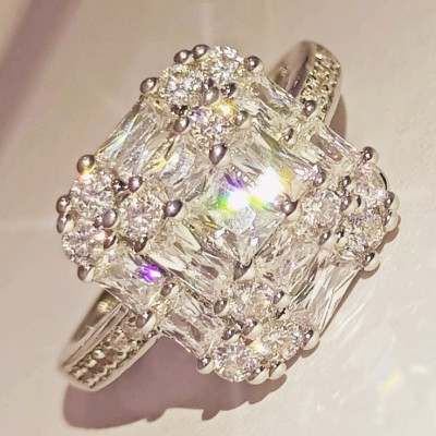 Unique White Sapphire Halo Engagement Ring