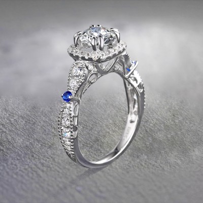 Round Cut White and Blue Sapphire Sterling Silver Halo Engagement Rings